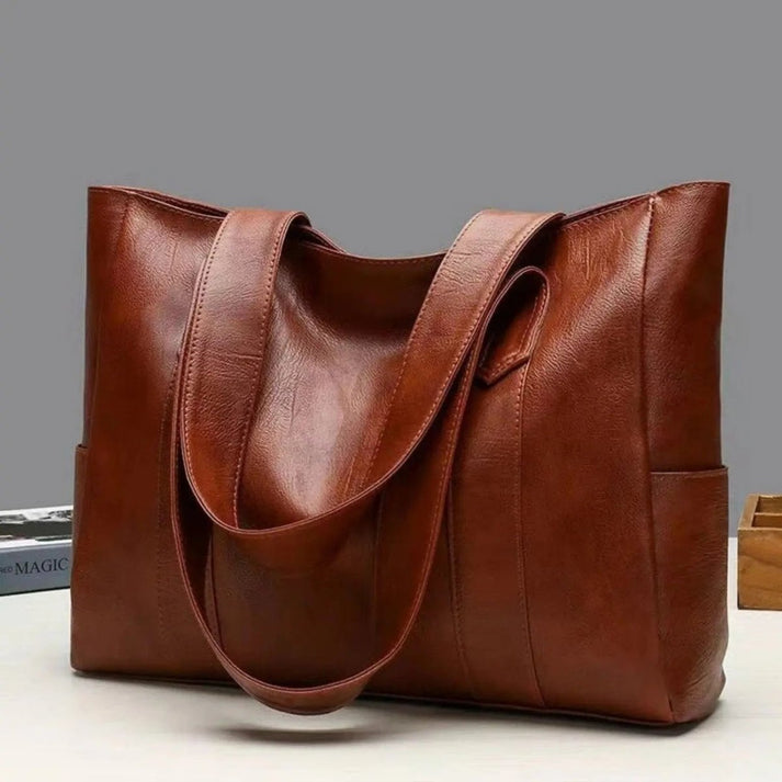 Bolso de hombro con bolsillo lateral