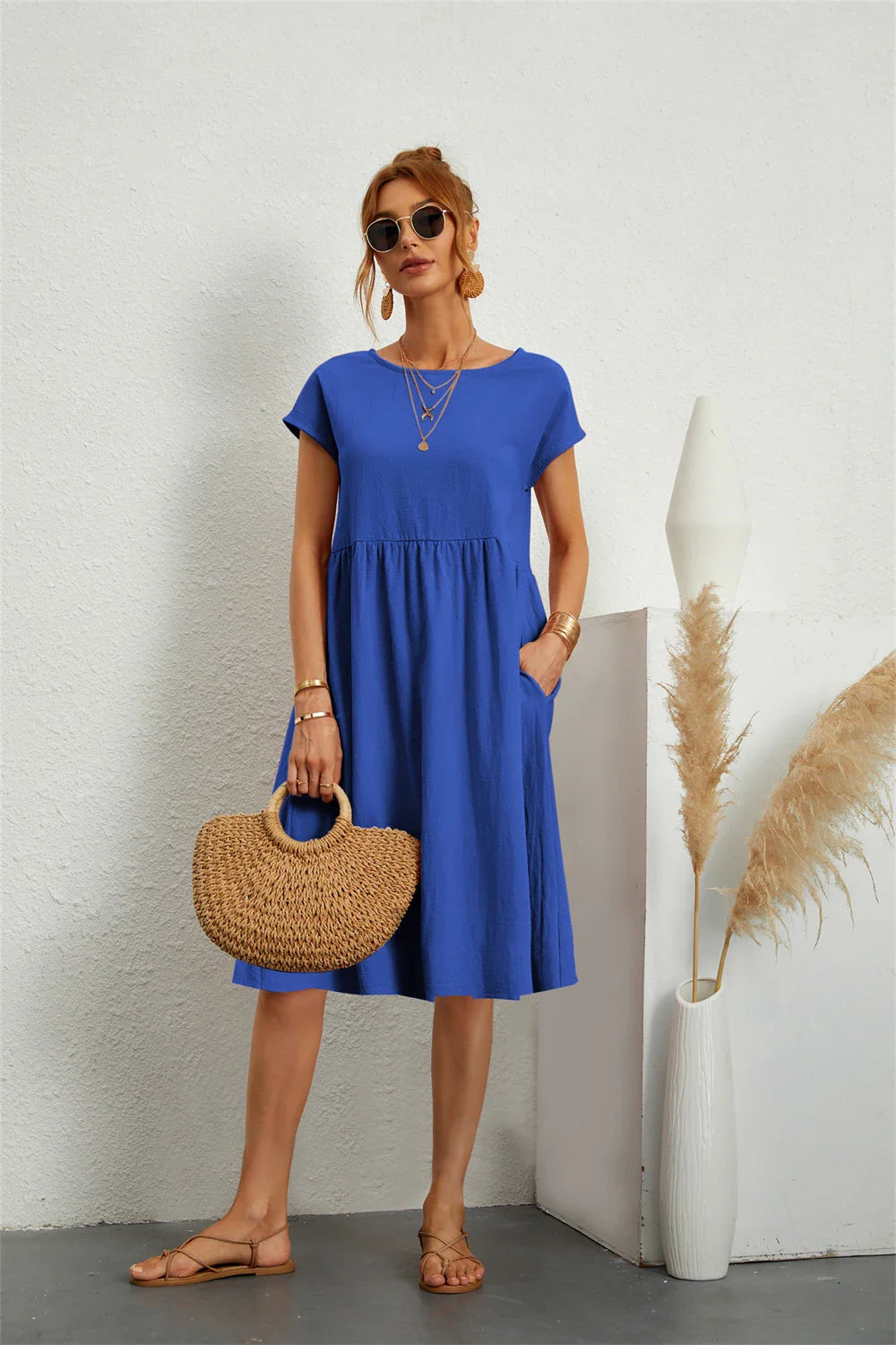 Vestido para mujer con cintura imperio y bolsillos laterales