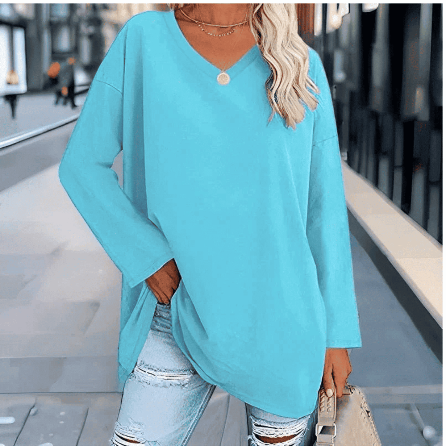 Blusa de Mujer de Corte Holgado - Cuello en V y Manga Larga