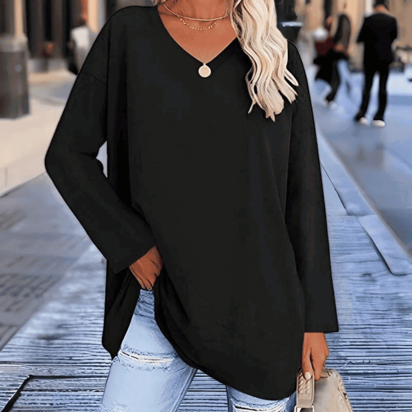 Blusa de Mujer de Corte Holgado - Cuello en V y Manga Larga