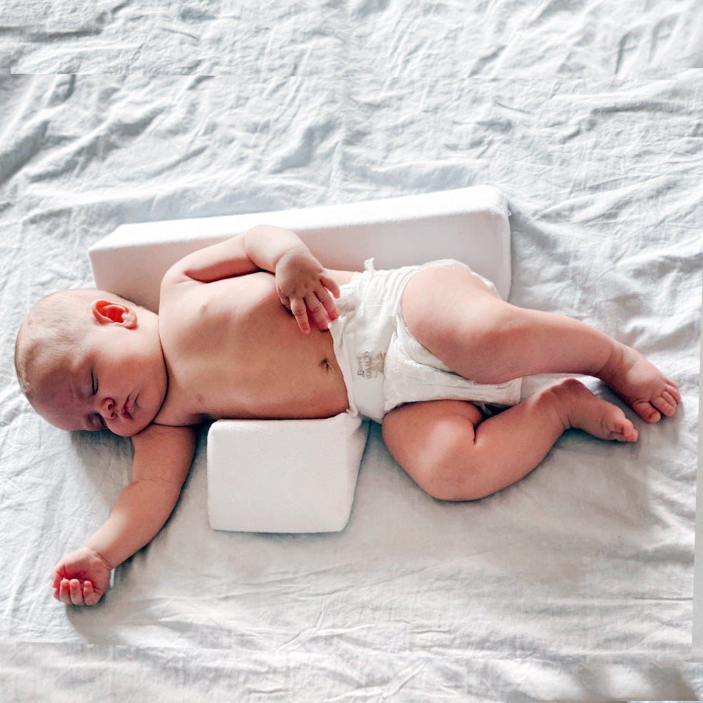 Almohada antivuelco para bebé con bloques dobles de espuma