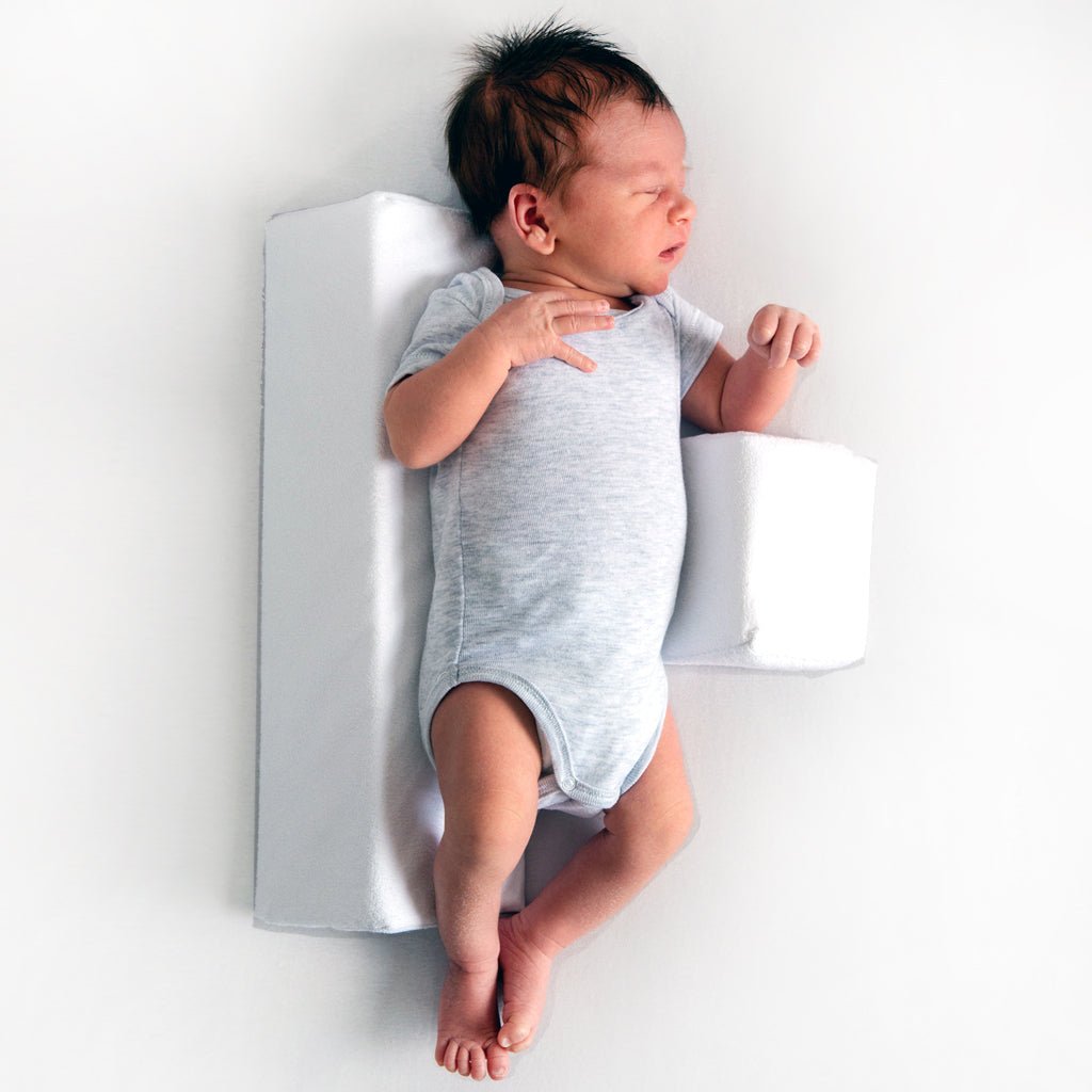 Almohada antivuelco para bebé con bloques dobles de espuma