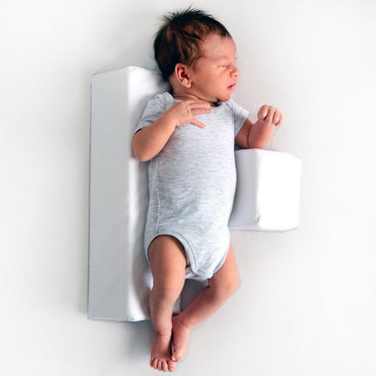 Almohada antivuelco para bebé con bloques dobles de espuma