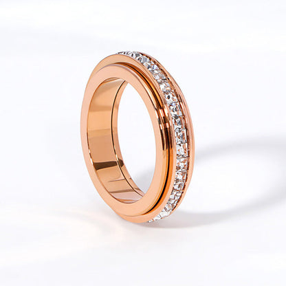 Anillo con banda giratoria de gemas