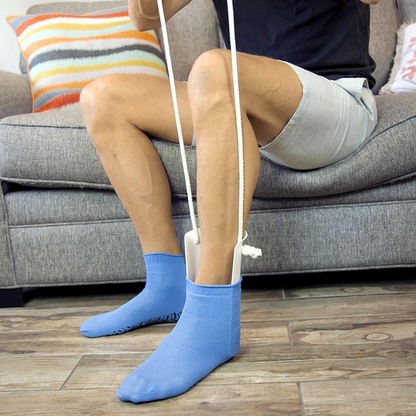 Ayuda para colocarse calcetines con cordones de tracción