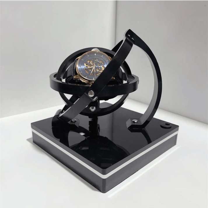 Bobinador de relojes giroscópico de triple eje