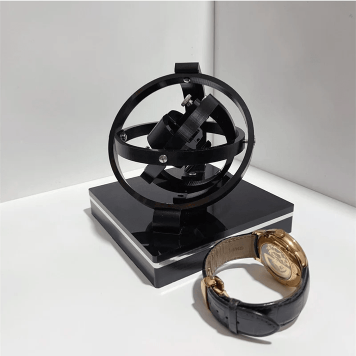 Bobinador de relojes giroscópico de triple eje