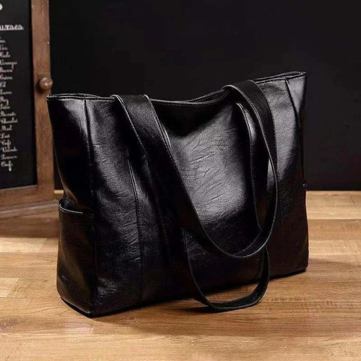 Bolso de hombro con bolsillo lateral