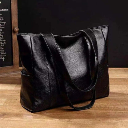 Bolso de hombro con bolsillo lateral
