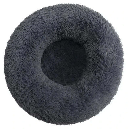 Cama circular para mascotas con borde elevado