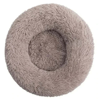 Cama circular para mascotas con borde elevado