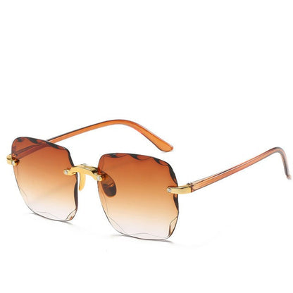 Gafas sin montura para mujer con lentes de borde ondulado