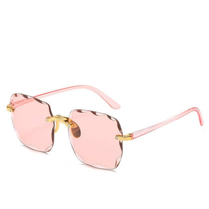 Gafas sin montura para mujer con lentes de borde ondulado