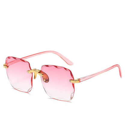 Gafas sin montura para mujer con lentes de borde ondulado