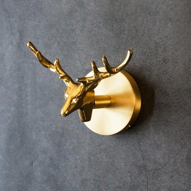 Gancho decorativo de pared con base circular