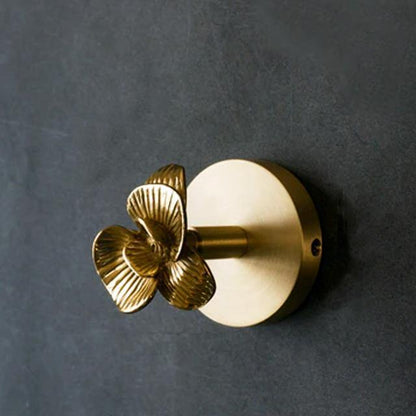 Gancho decorativo de pared con base circular