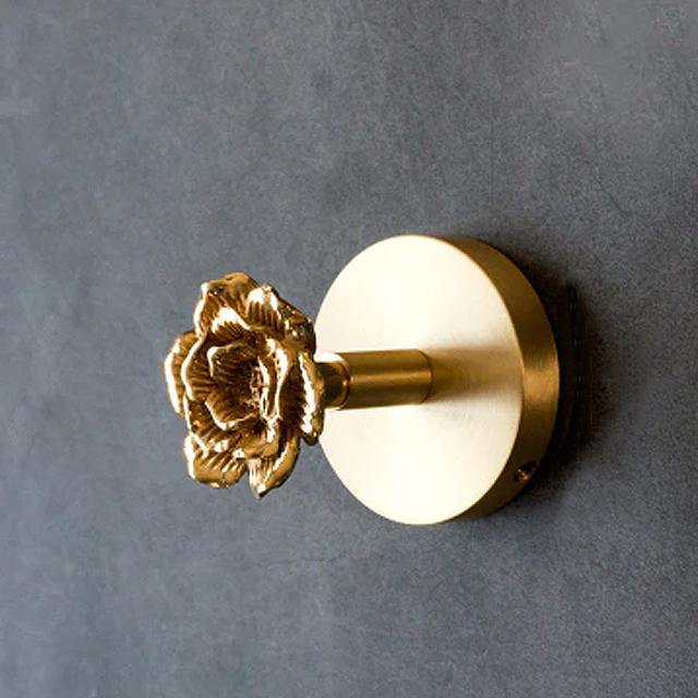 Gancho decorativo de pared con base circular