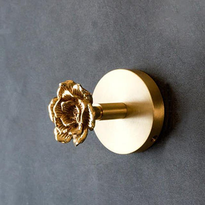 Gancho decorativo de pared con base circular