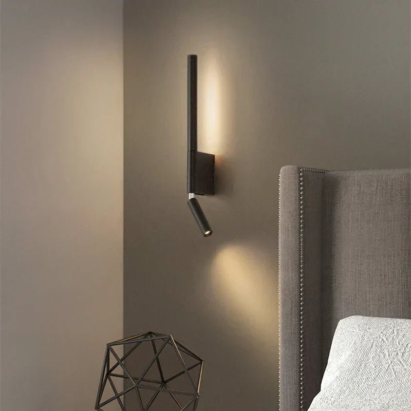 Lámpara de pared cilíndrica con articulación giratoria