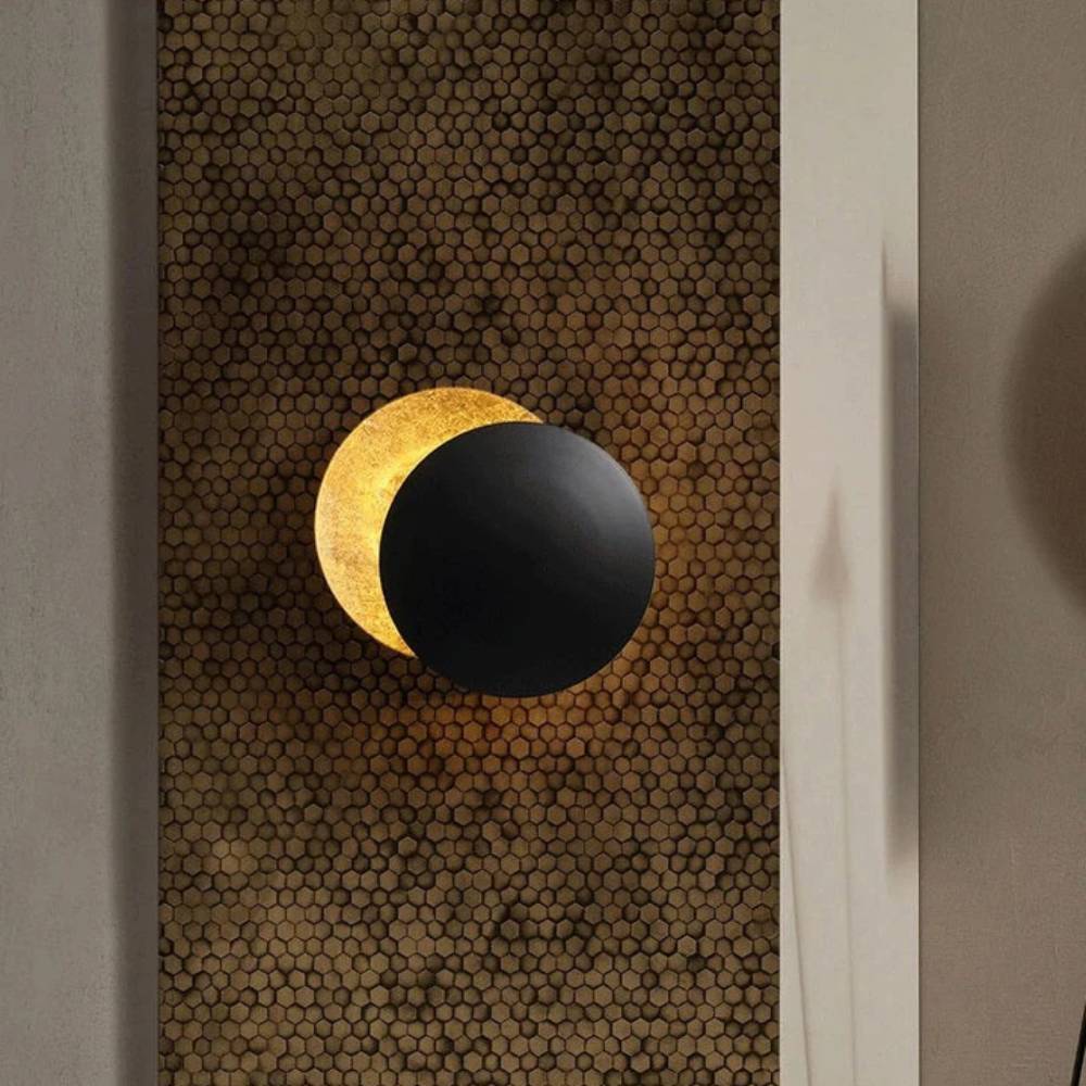 Lámpara de pared con discos circulares superpuestos