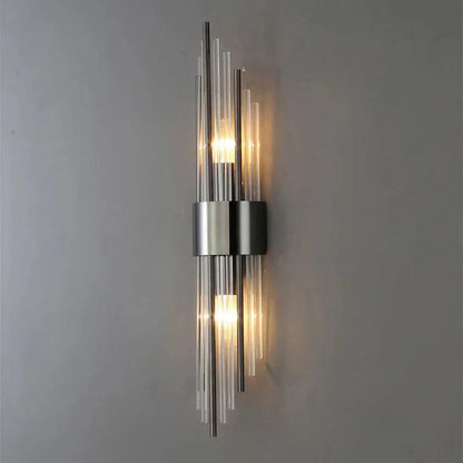 Lámpara de pared vertical con varillas cilíndricas y tubos de vidrio