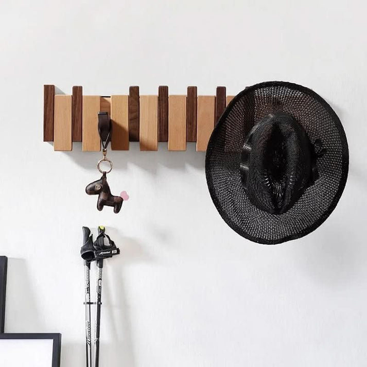 Perchero de pared con ganchos abatibles