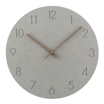 Reloj de pared analógico redondo con números arábigos