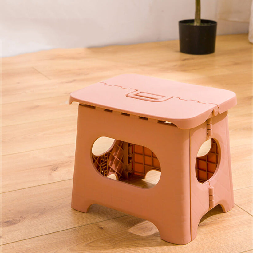 Taburete plegable con mecanismo colapsable