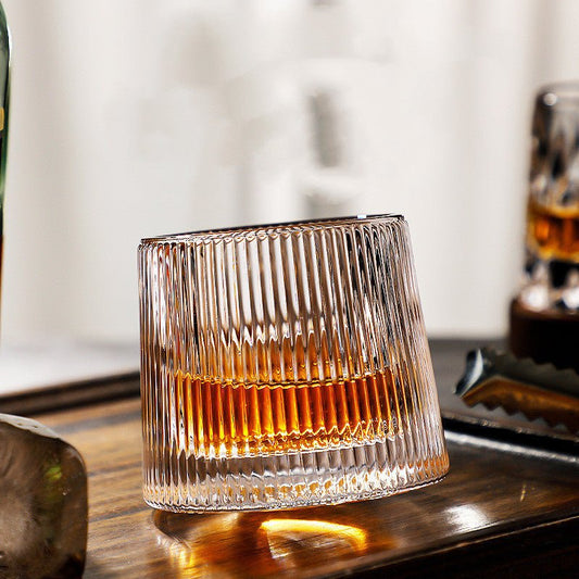 Vaso de whisky giratorio con base redondeada