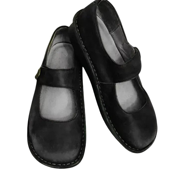 Zapatos para mujer con puntera redondeada y tira con botón